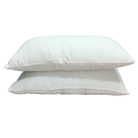 Two large white fiber-filled sleeping pillows